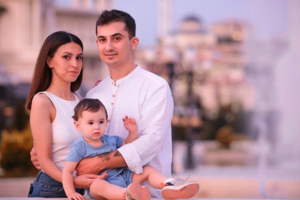 Charming family enjoying a day outdoors in Ankara, capturing delightful emotions.
